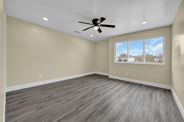 unfurnished room featuring ceiling fan and wood-type flooring