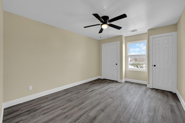 unfurnished bedroom featuring ceiling fan and light hardwood / wood-style floors