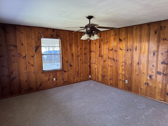 carpeted empty room with ceiling fan