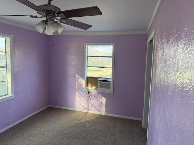 empty room featuring crown molding, carpet flooring, cooling unit, and ceiling fan