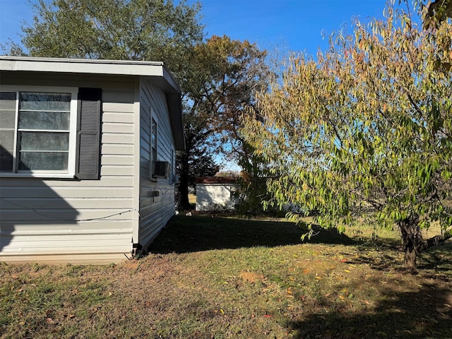 view of home's exterior featuring a lawn