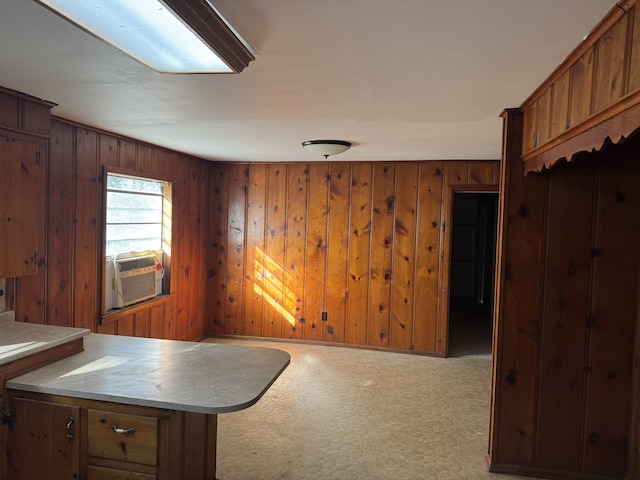 interior space with wooden walls and cooling unit