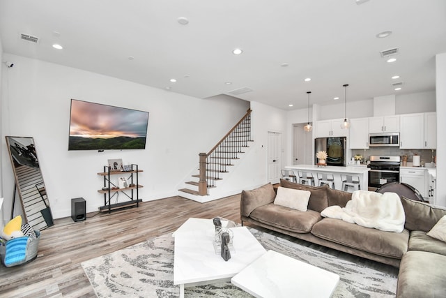 living room featuring light hardwood / wood-style floors