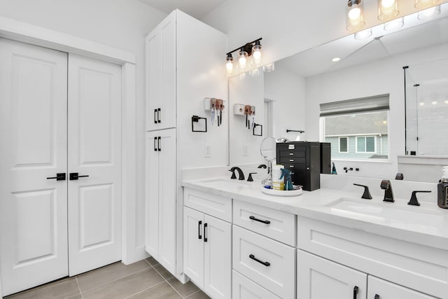 bathroom featuring vanity and tile patterned floors