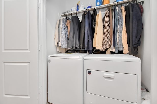 laundry room featuring separate washer and dryer