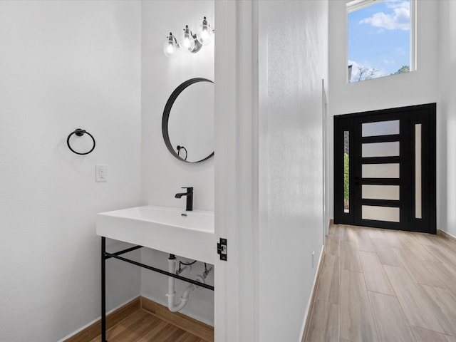 bathroom featuring wood-type flooring