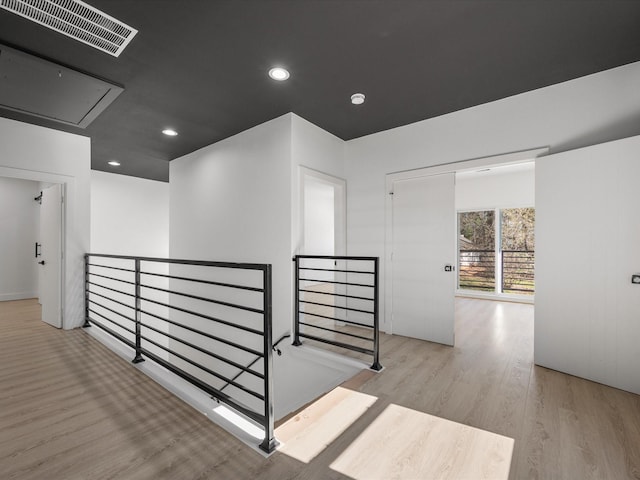 hall featuring light hardwood / wood-style floors