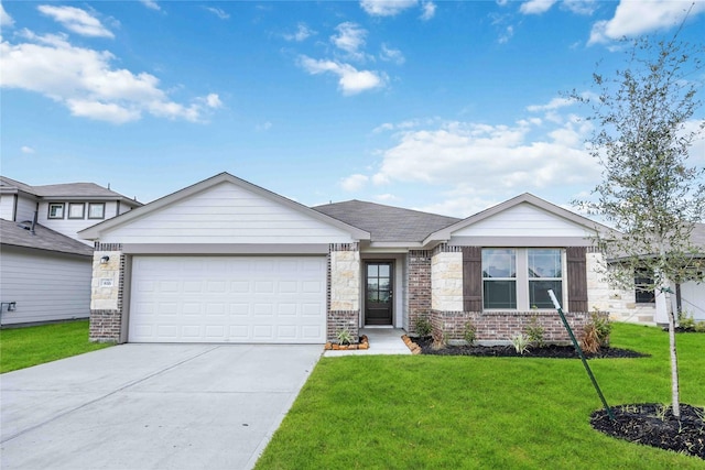 view of front facade with a front yard and a garage