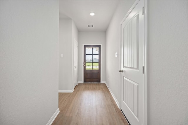 doorway featuring light wood-type flooring