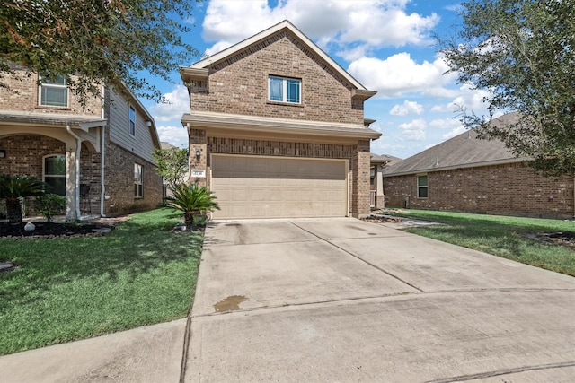 view of front of house with a garage and a front lawn