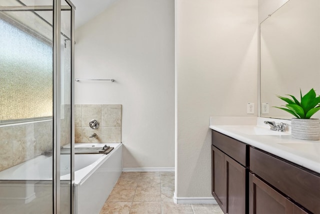 bathroom with a bath and vanity