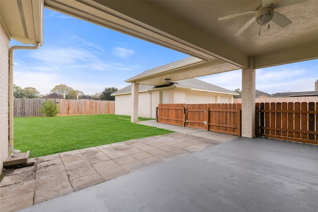 view of patio with ceiling fan