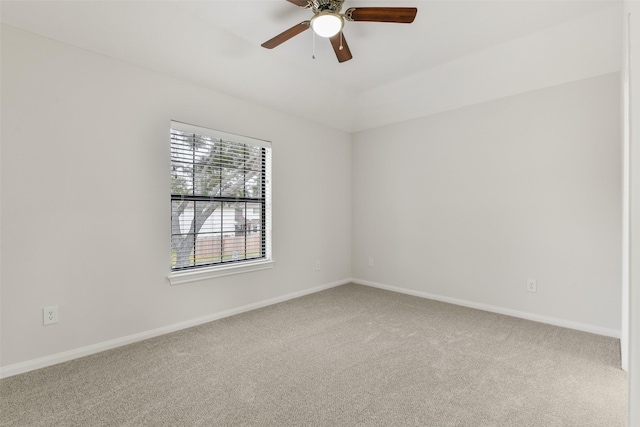 unfurnished room featuring ceiling fan and carpet floors