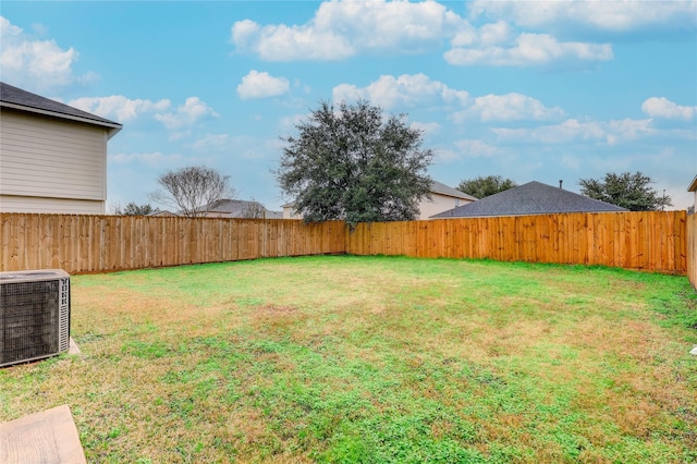 view of yard featuring central AC