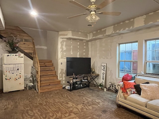 living room with ceiling fan