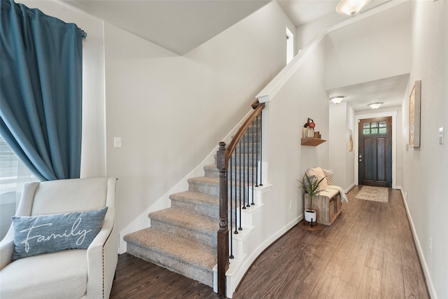 foyer entrance with wood-type flooring