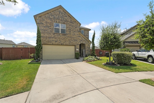 view of front of property with a garage and a front yard