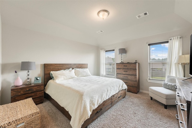 bedroom featuring light colored carpet