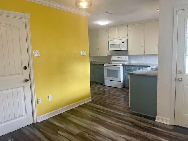 kitchen with white appliances, dark wood-style flooring, white cabinets, baseboards, and ornamental molding