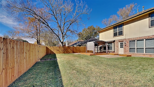 view of yard with a patio area