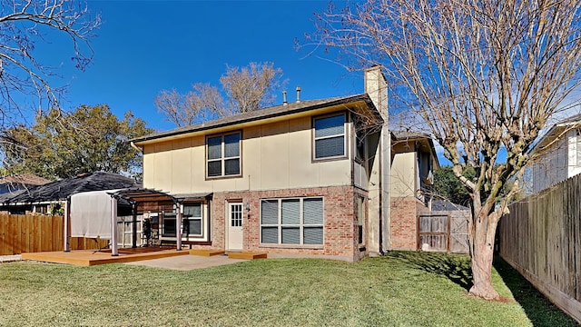 rear view of property with a patio area, a lawn, and a pergola