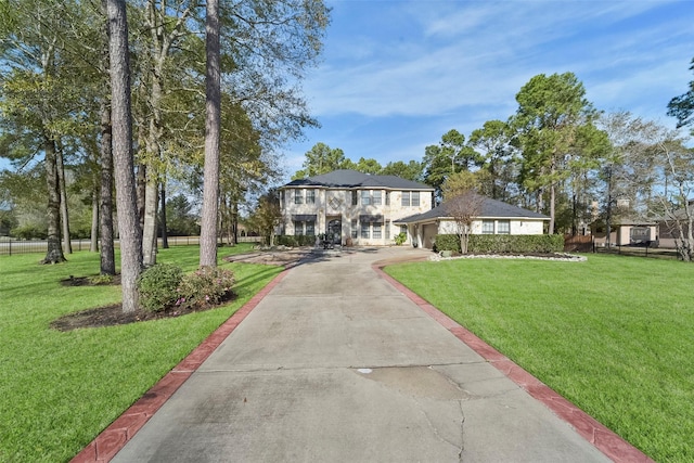 view of front of home featuring a front lawn