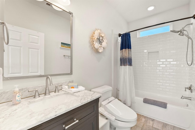 full bath featuring toilet, recessed lighting, vanity, visible vents, and shower / tub combo with curtain