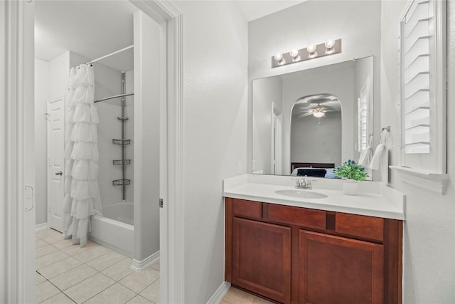 bathroom with vanity, ceiling fan, shower / bath combo, and tile patterned flooring