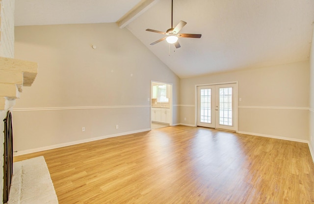 unfurnished living room featuring beam ceiling, light hardwood / wood-style flooring, and french doors