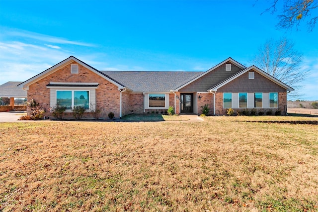 ranch-style home with a front yard