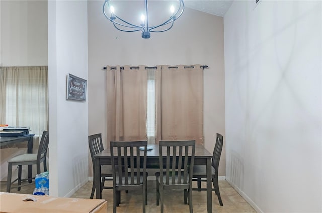 dining area with vaulted ceiling