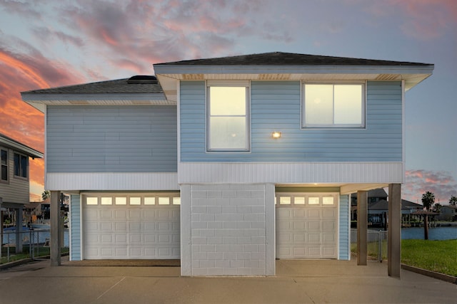 view of front of home with a garage