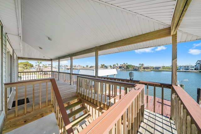 deck featuring a water view