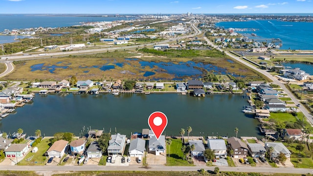 bird's eye view with a water view