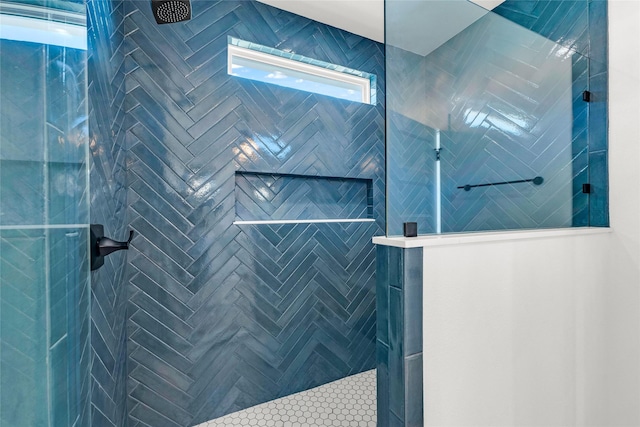 bathroom featuring tiled shower