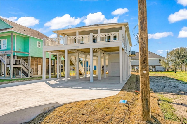 rear view of house with a carport