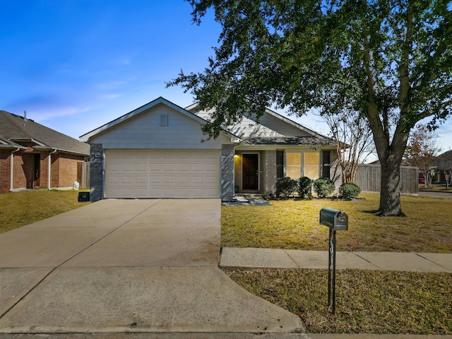 single story home featuring a garage and a front yard