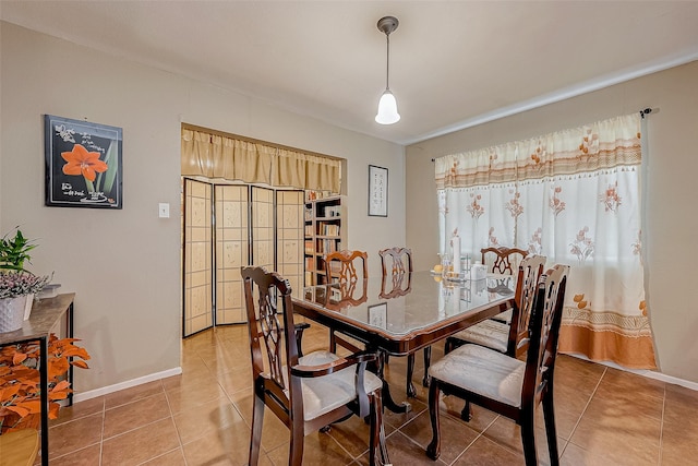 dining room with tile patterned floors