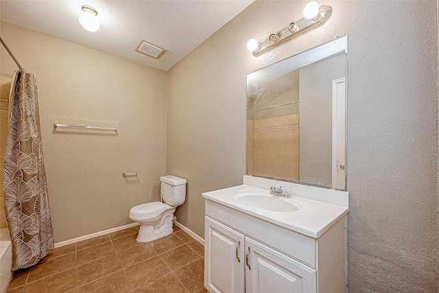 full bathroom featuring a textured ceiling, tile patterned floors, vanity, toilet, and shower / bath combo