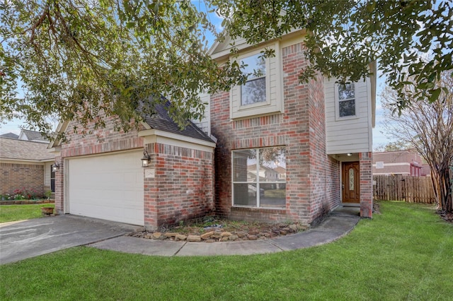 view of front facade featuring a garage and a front lawn