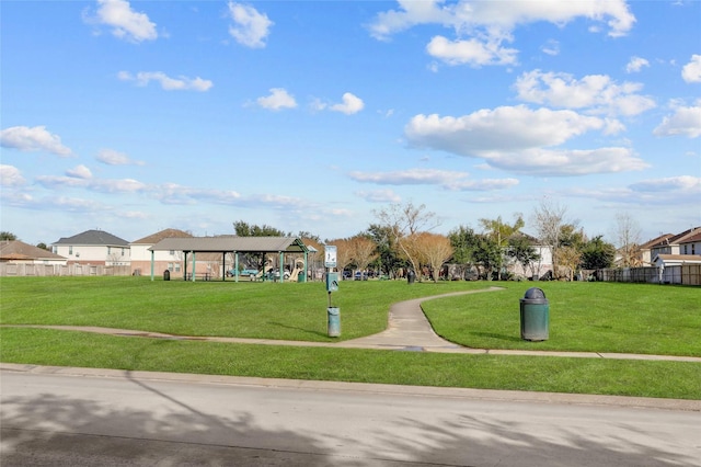 view of property's community featuring a gazebo and a lawn