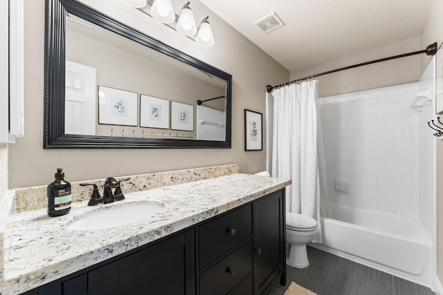 full bathroom featuring vanity, toilet, and shower / bathtub combination with curtain