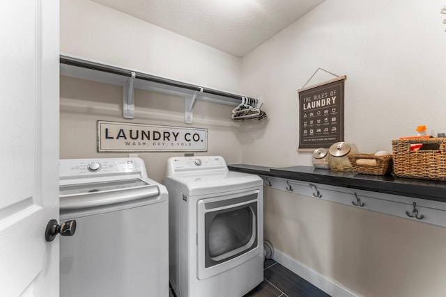 washroom with independent washer and dryer