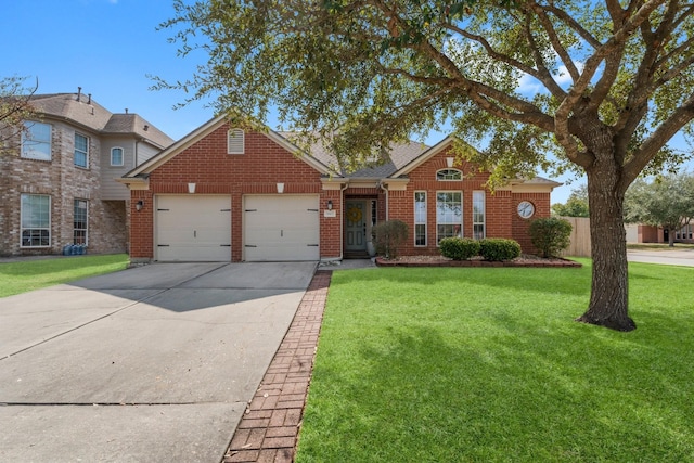 view of front of property with a garage and a front yard