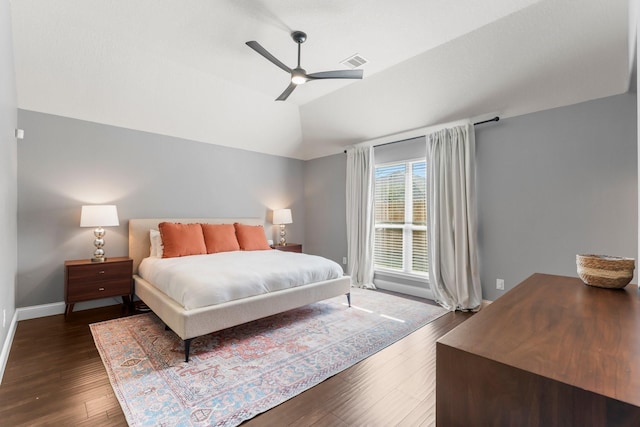 bedroom featuring dark wood-type flooring, ceiling fan, and lofted ceiling