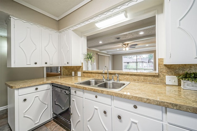 kitchen featuring sink, white cabinets, decorative backsplash, and dishwasher