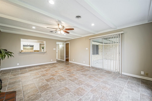 unfurnished room with beam ceiling and ceiling fan