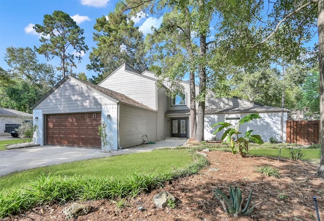 view of front of house featuring a garage and french doors