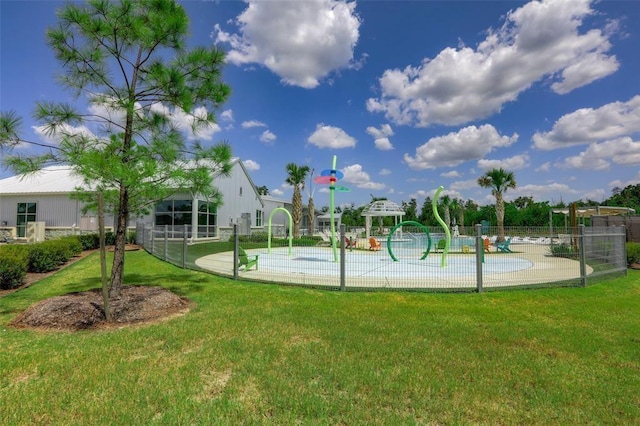 view of sport court featuring a yard and a playground