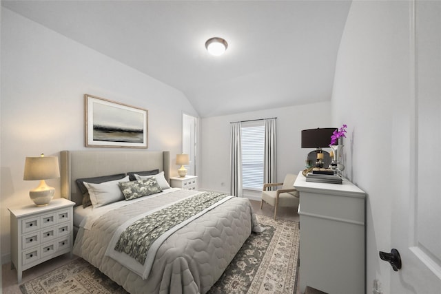 bedroom featuring vaulted ceiling